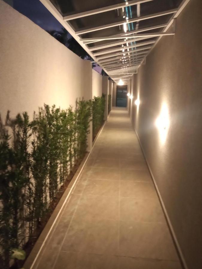 Sala living em prédio Familiar na Av da Praia Santos  Exterior foto